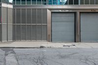 two commercial garages on a city street with the doors open and closed for business