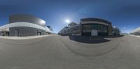 there are some very tall buildings in the viewfinders of this 360 - lens