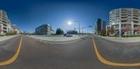 a reflection of a car on a parking lot with buildings in the background and another one in the foreground