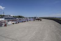 the dock on the waterfront of the small village in ontario, with many boats docked