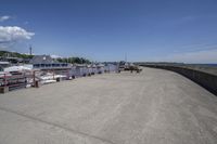 the dock on the waterfront of the small village in ontario, with many boats docked