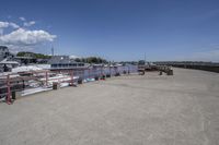 the dock on the waterfront of the small village in ontario, with many boats docked