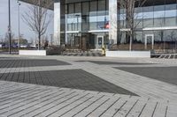 this is an outdoor space with a lot of tiles on it in a large open courtyard