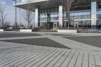 this is an outdoor space with a lot of tiles on it in a large open courtyard