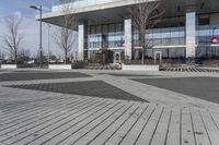 this is an outdoor space with a lot of tiles on it in a large open courtyard