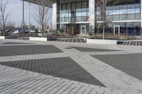 this is an outdoor space with a lot of tiles on it in a large open courtyard