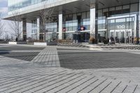 this is an outdoor space with a lot of tiles on it in a large open courtyard