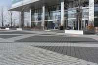 this is an outdoor space with a lot of tiles on it in a large open courtyard