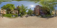 an 360 - view of the street in front of a house and a parking lot