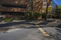 a stop sign on a city street by tall buildings in a city area of an urban setting