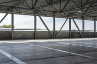 a large metal roof in a room with floor mats that allow shade and light to pass through