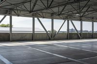 a large metal roof in a room with floor mats that allow shade and light to pass through