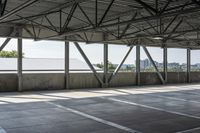 a large metal roof in a room with floor mats that allow shade and light to pass through