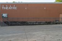 a view of a theatre and the steps leading to it is being used as a place for performing