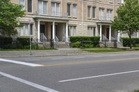 the street view shows some residential homes, and the street below them is a road