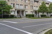 the street view shows some residential homes, and the street below them is a road