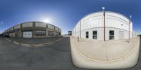 an image of a 360 - turn view outside of a building with a street in front and another side