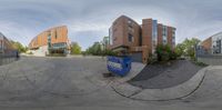 there is a fisheye lens view of the university building from across the street taken with a goproam lens