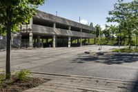 a concrete parking garage in an empty area in the city center of a suburban area