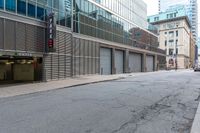 the empty city street has parked cars and parking spaces on each side of it, with a sign that says, don't leave out