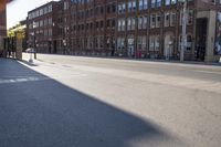 Town Asphalt Lane with Brick Walls