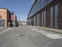 the empty warehouse area is all empty and ready to be used as a place for events