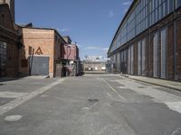 the empty warehouse area is all empty and ready to be used as a place for events