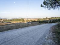 Tuscany: A Breathtaking Landscape of Trees and Clouds