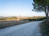 Tuscany: A Breathtaking Landscape of Trees and Clouds