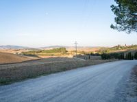 Tuscany: A Breathtaking Landscape of Trees and Clouds