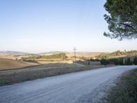 Tuscany: A Breathtaking Landscape of Trees and Clouds