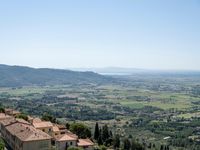 the view from a high point on the hills in italy is pretty and peaceful,