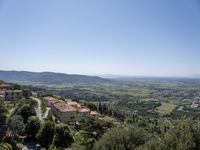 the view from a high point on the hills in italy is pretty and peaceful,