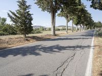 Picturesque Road through Rural Landscape in Tuscany, Italy