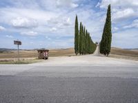 Scenic Road with Cypress Trees in Tuscany, Italy