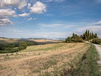 an image of a scenic landscape in the country side of italy, where the bike rider has taken a rest