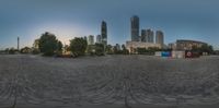 an abstract fisheye lens panoramic image of a city skyline at twilight time