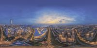 an aerial photo shows the city at twilight from a bird's eye view looking down on a road and many streets