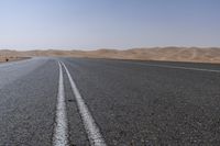 UAE Highway: Mountains on the Horizon with a Clear Sky