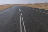 UAE Highway: Mountains on the Horizon with a Clear Sky