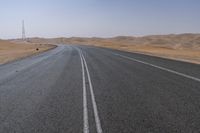 UAE Highway: Mountains on the Horizon with a Clear Sky