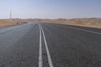 UAE Highway: Mountains on the Horizon with a Clear Sky