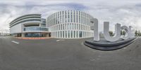 a picture taken in 360 - view and of a building that says uc in front of it