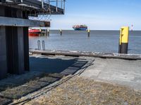 this is the image of an under construction walkway and walkway next to the water in the background