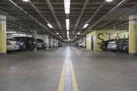 an underground parking garage with rows of cars parked in it's space that looks like it could have a lot of people going to work