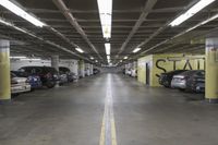 an underground parking garage with rows of cars parked in it's space that looks like it could have a lot of people going to work