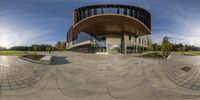 a fisheye lens photo of the entrance to the building at the university of british columbia