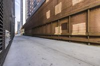a street in an alley with two lanes full of brick and broken out doors and garbage on the ground