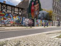 Urban architecture in Berlin city with graffiti wall