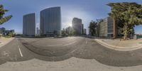 360 - camera image with city buildings in background in urban location that is being transformed to resemble a fish eye lens